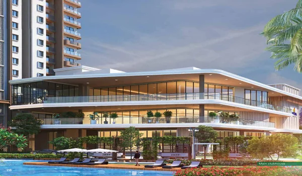A daytime architectural rendering of the grand three-story clubhouse at Sattva City. The building features sleek modern architecture with expansive glass facades and wraparound balconies. In the foreground, a crystal-clear blue swimming pool is lined with lounge chairs and white umbrellas, surrounded by manicured gardens and tall residential towers.